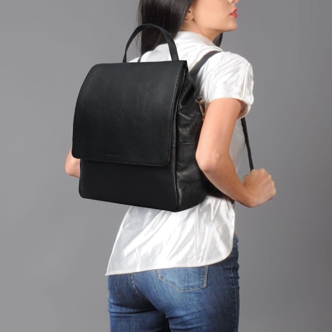 Donna Leather Diaper Bag in premium full grain leather with multiple pockets and versatile carrying options.