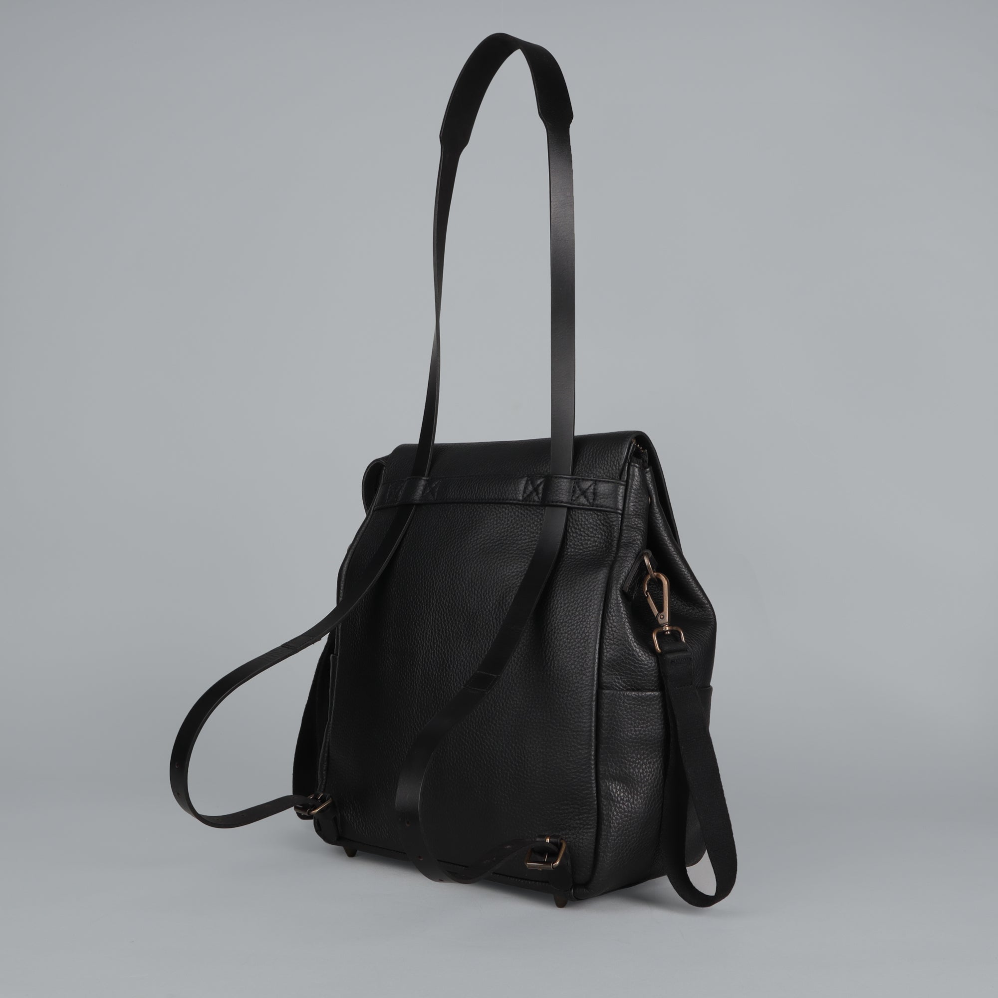 Donna Leather Diaper Bag in premium full grain leather with multiple pockets and versatile carrying options.