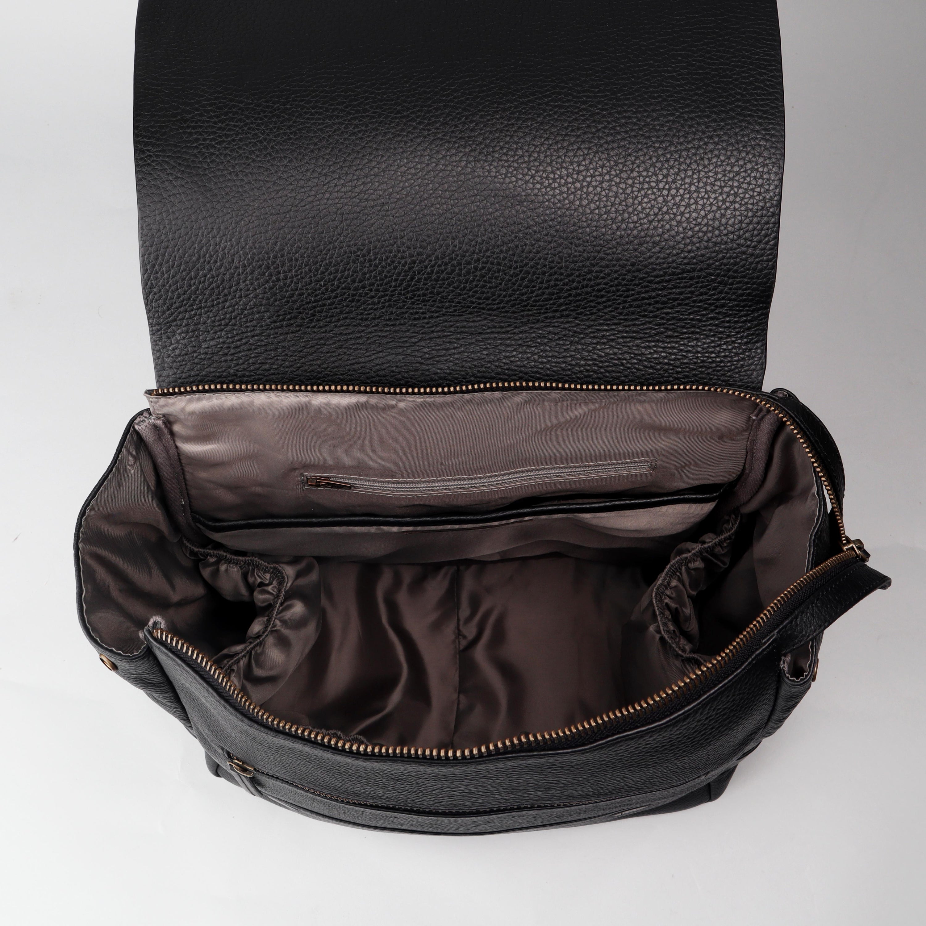 Donna Leather Diaper Bag in premium full grain leather with multiple pockets and versatile carrying options.