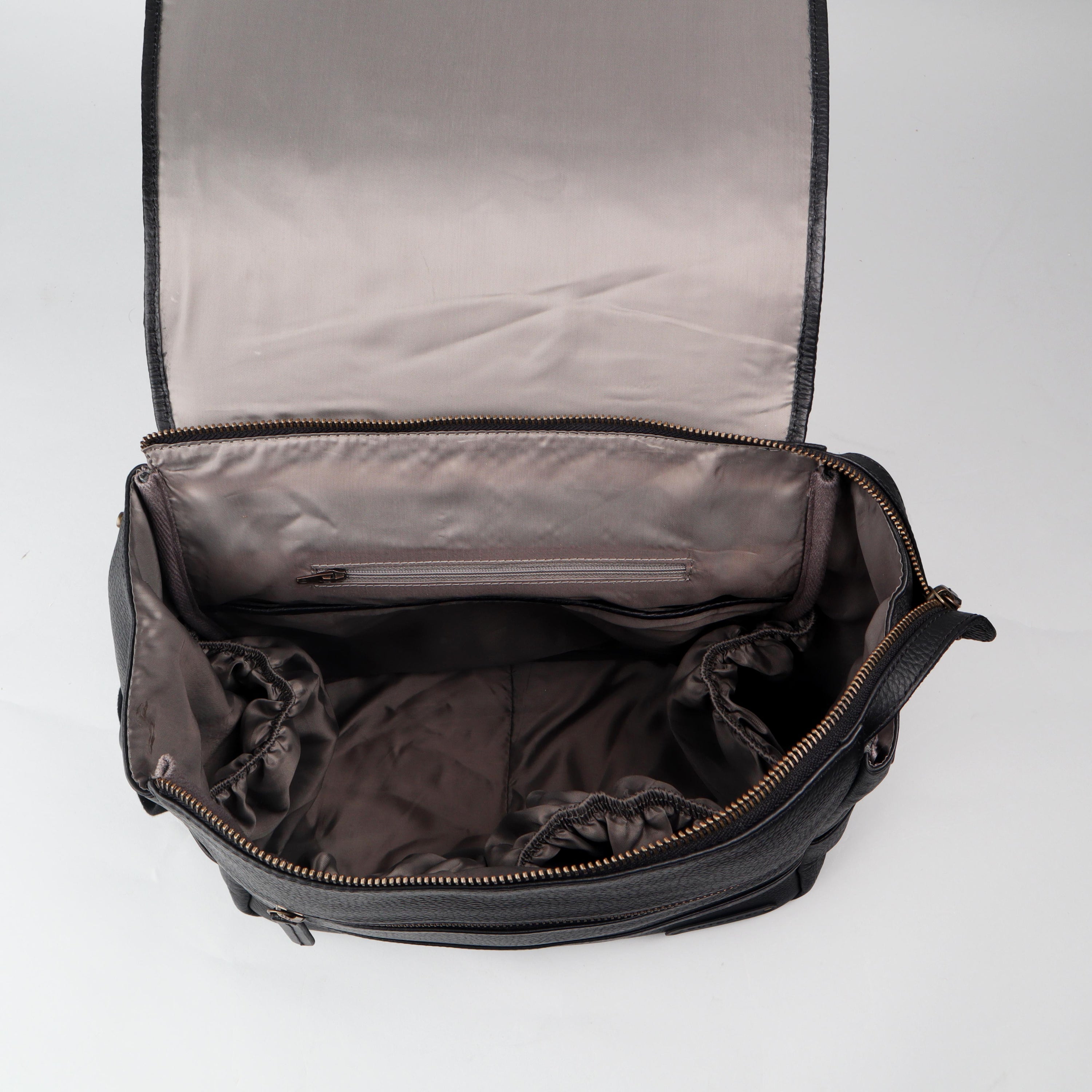 Donna Weaved Leather Diaper Bag featuring premium full grain leather, multiple pockets, and versatile carrying options.