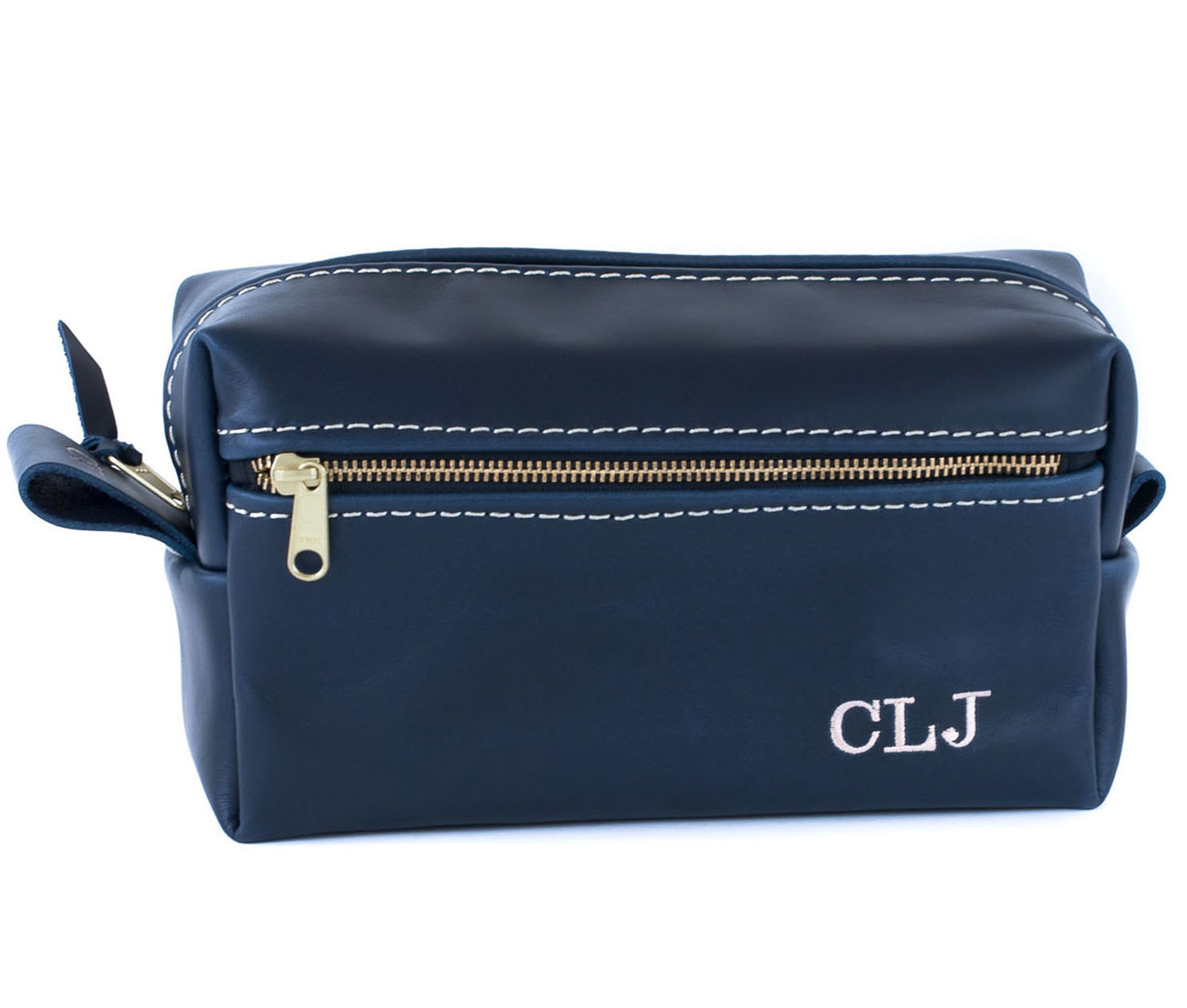 Double Zipper Toiletry Bag made from full grain leather with water-resistant lining and heavy-duty zippers, ideal for travel organization.