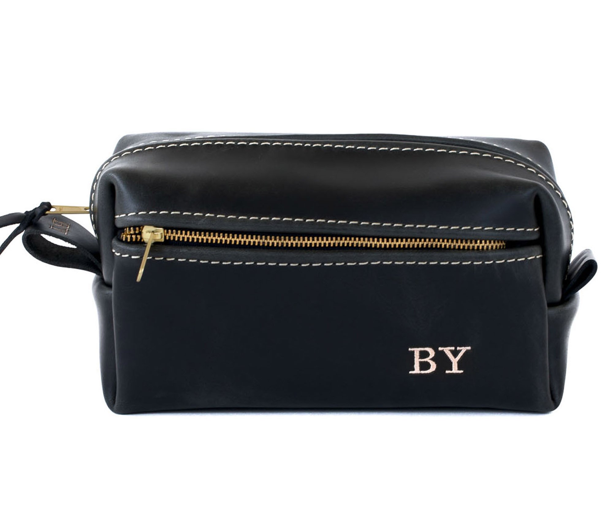 Double Zipper Toiletry Bag made from full grain leather with water-resistant lining and heavy-duty zippers, ideal for travel organization.