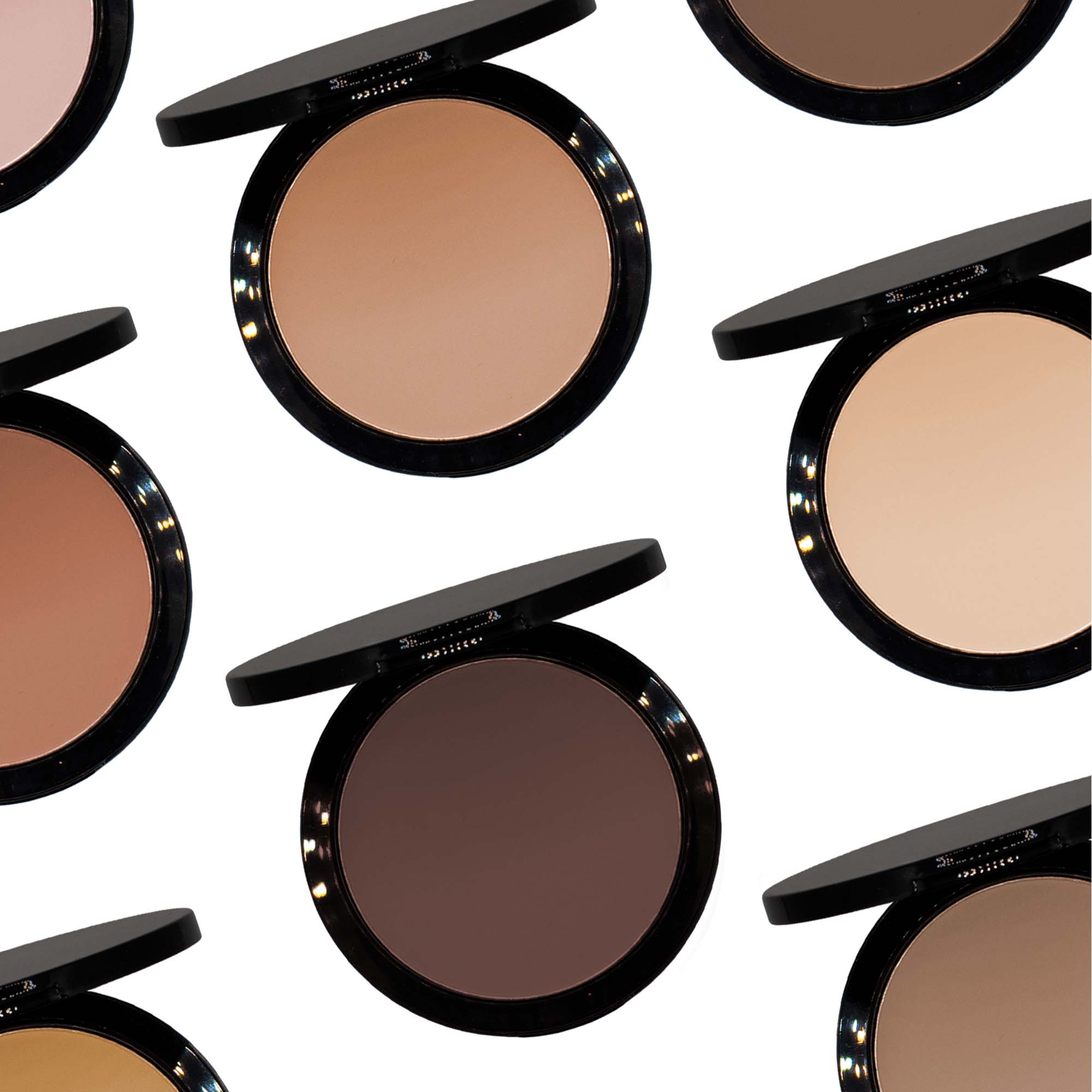 Dual Blend Powder Foundation - Malibu in a sleek compact, showcasing its powdery texture and elegant design.