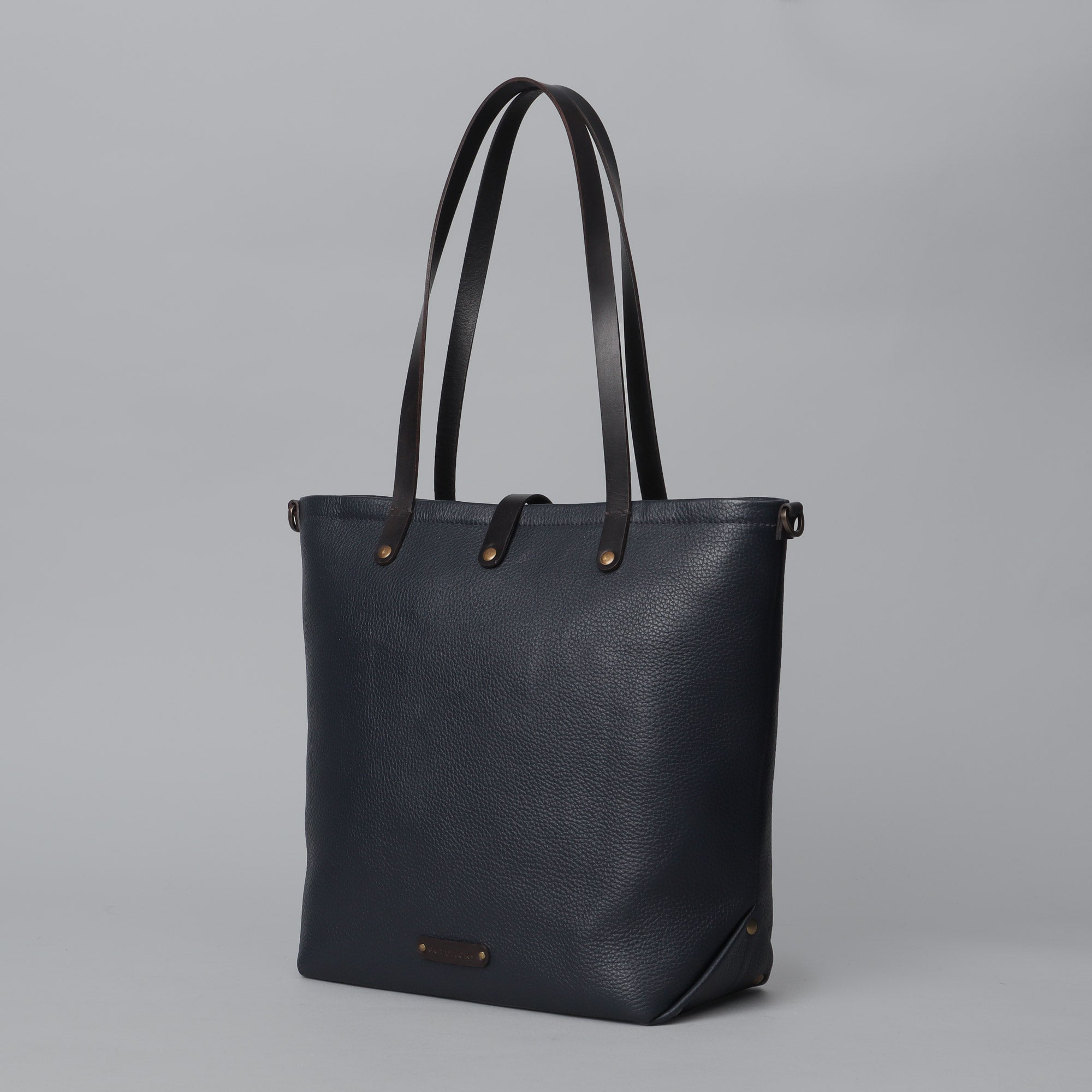 Dublin Leather Tote showcasing premium full grain leather, spacious compartments, and elegant design.