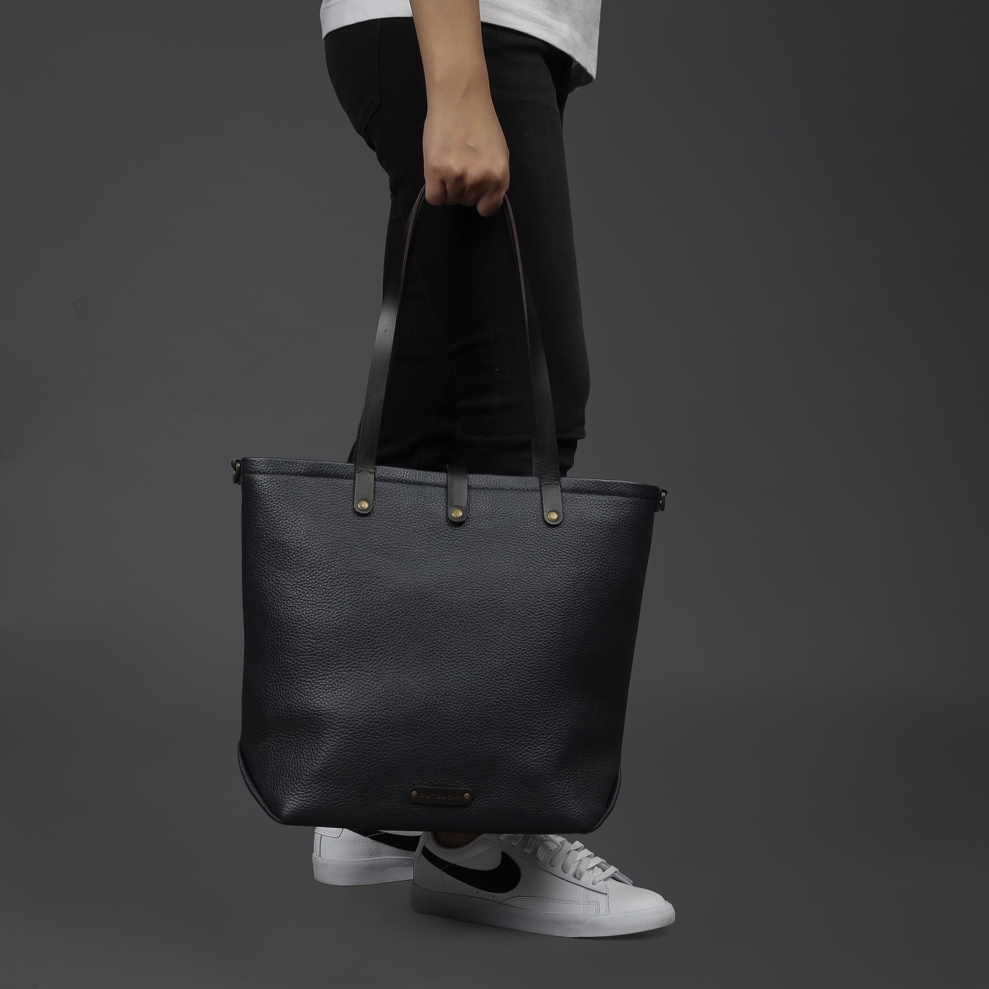 Dublin Leather Tote showcasing premium full grain leather, spacious compartments, and elegant design.