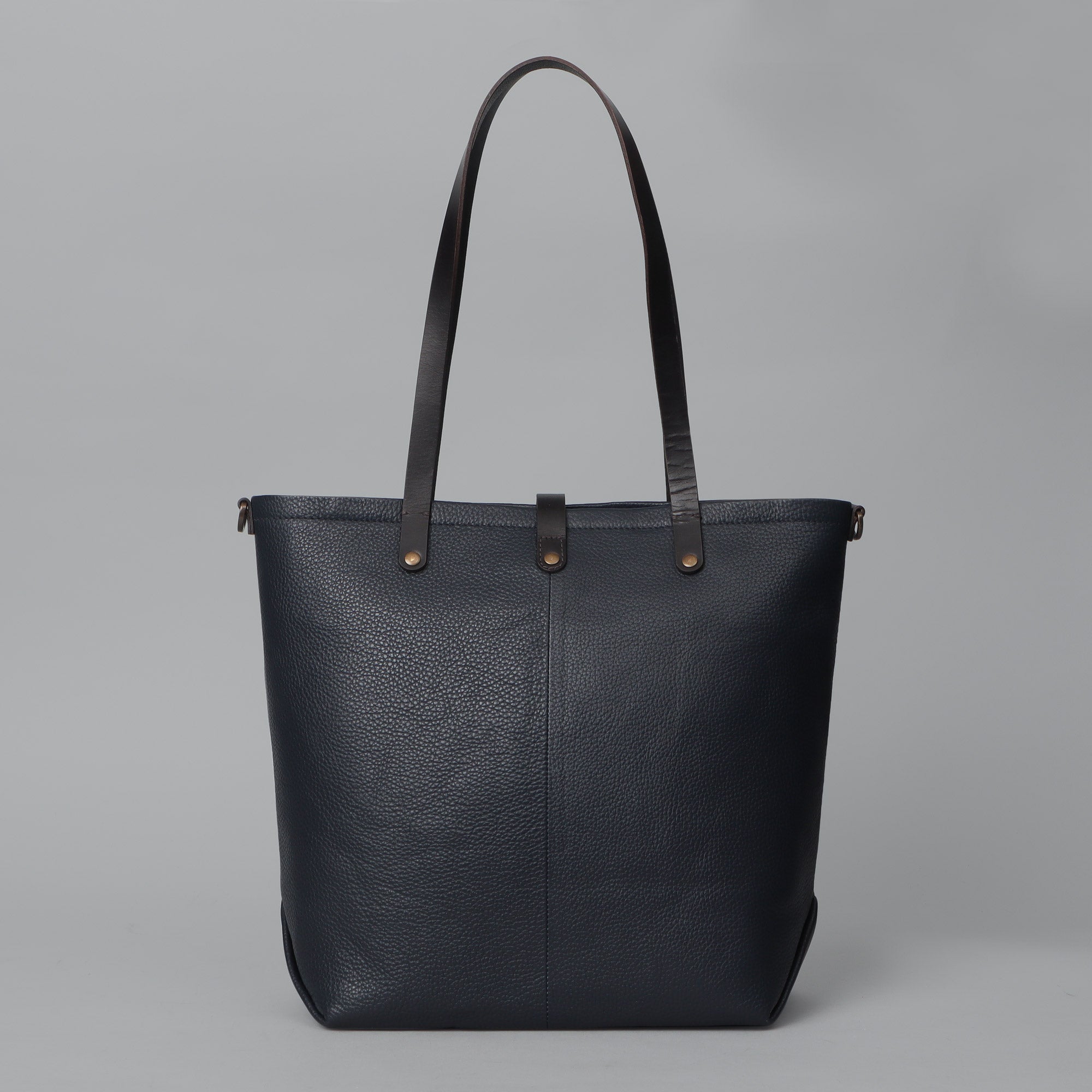 Dublin Leather Tote showcasing premium full grain leather, spacious compartments, and elegant design.