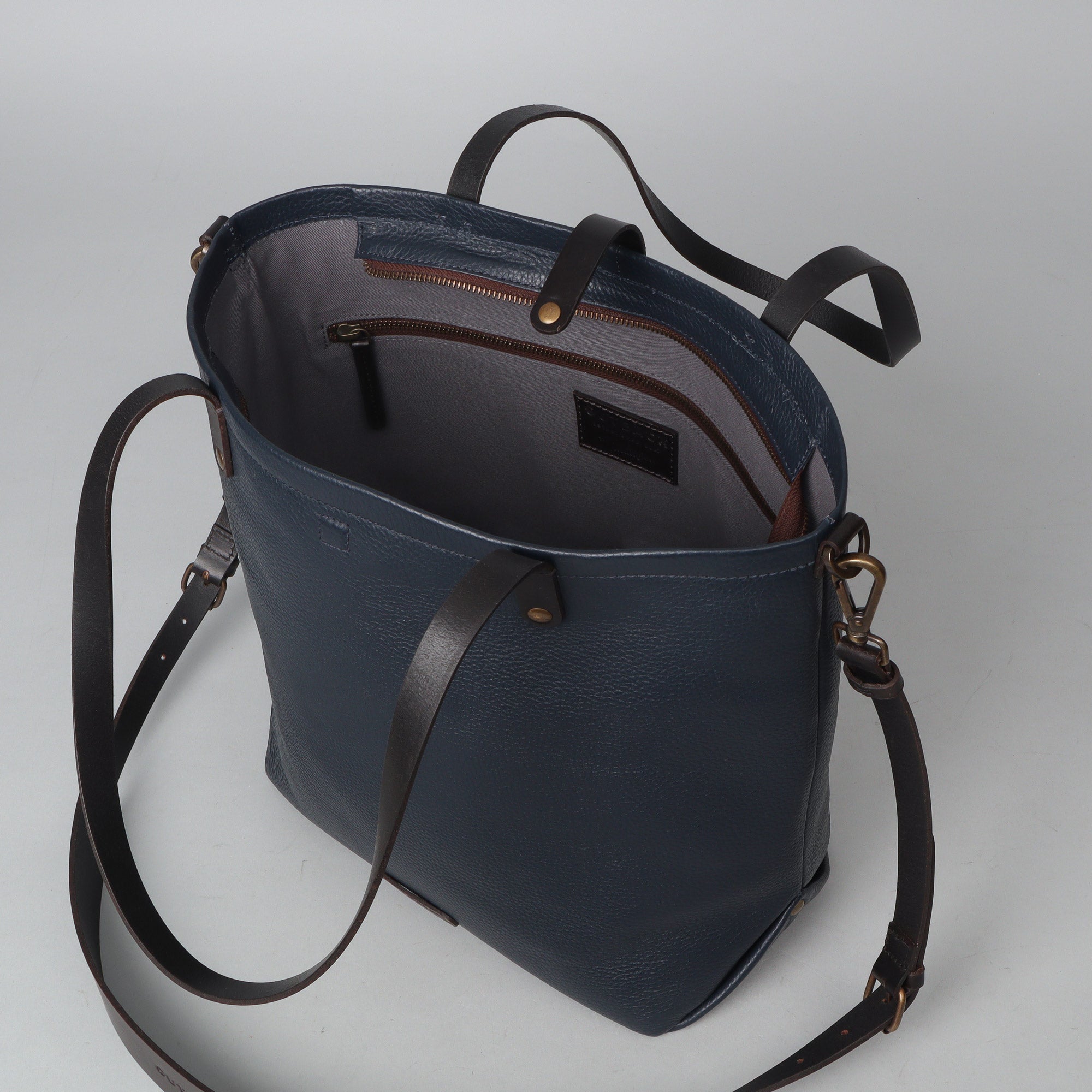 Dublin Leather Tote showcasing premium full grain leather, spacious compartments, and elegant design.