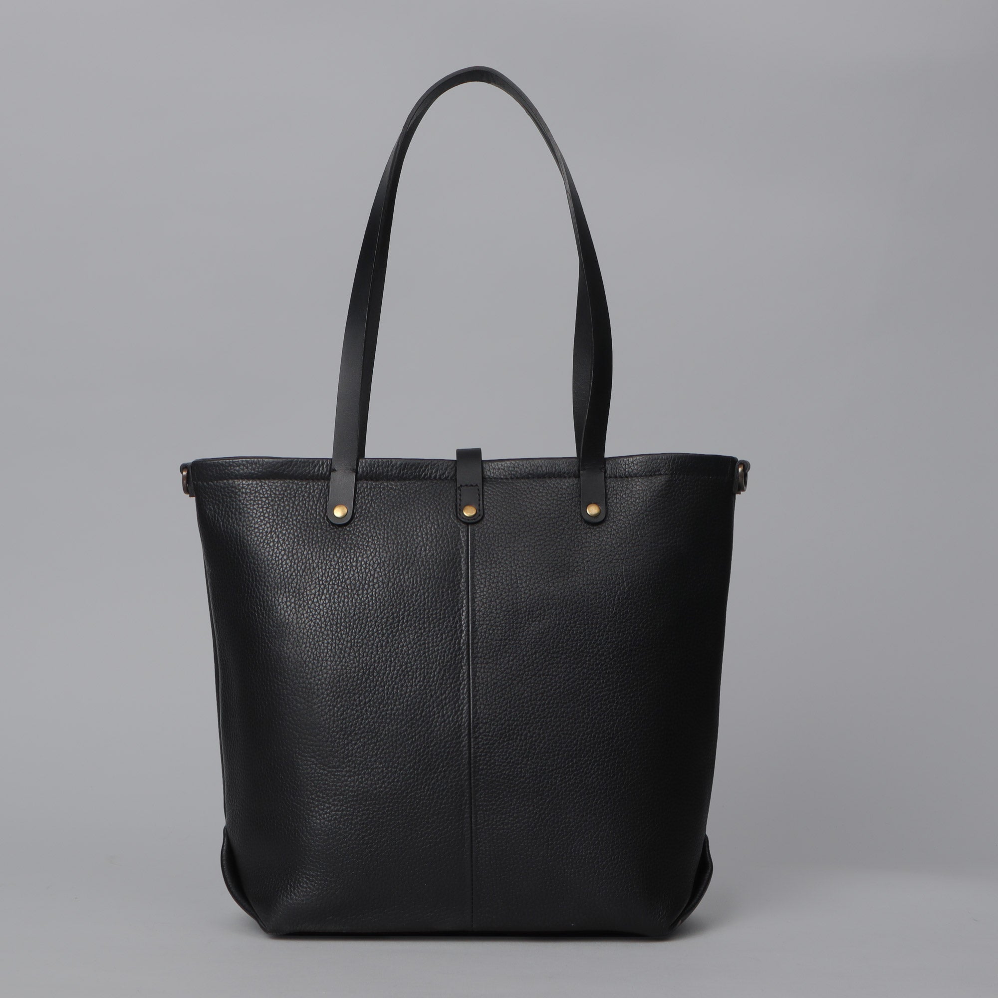 Dublin Leather Tote showcasing premium full grain leather, spacious compartments, and durable straps, perfect for laptops and daily essentials.