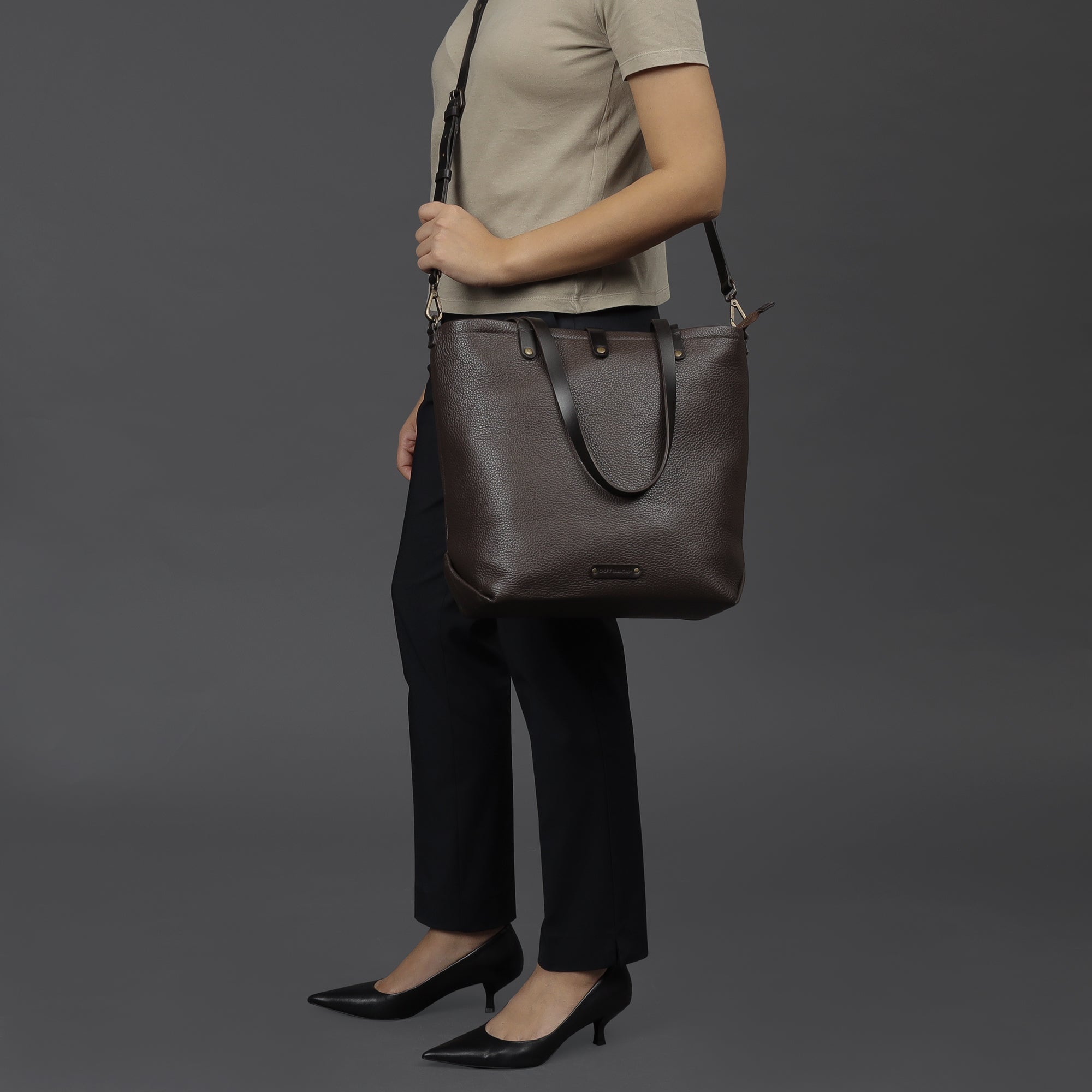 Dublin Leather Tote showcasing premium full grain leather, spacious compartments, and durable straps, perfect for laptops and everyday essentials.