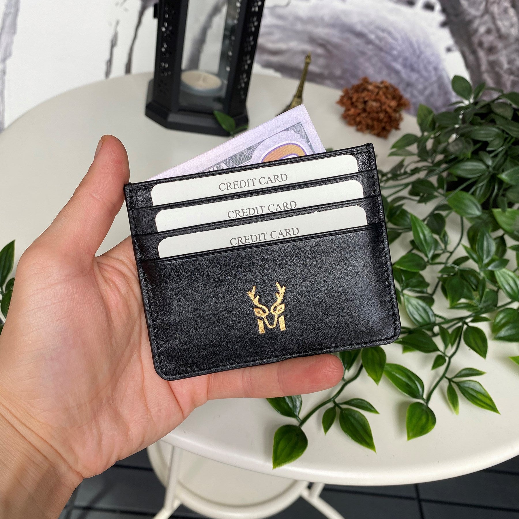 Ducal Genuine Leather Ultra Slim Card Holder in black, showcasing its sleek design and card slots.