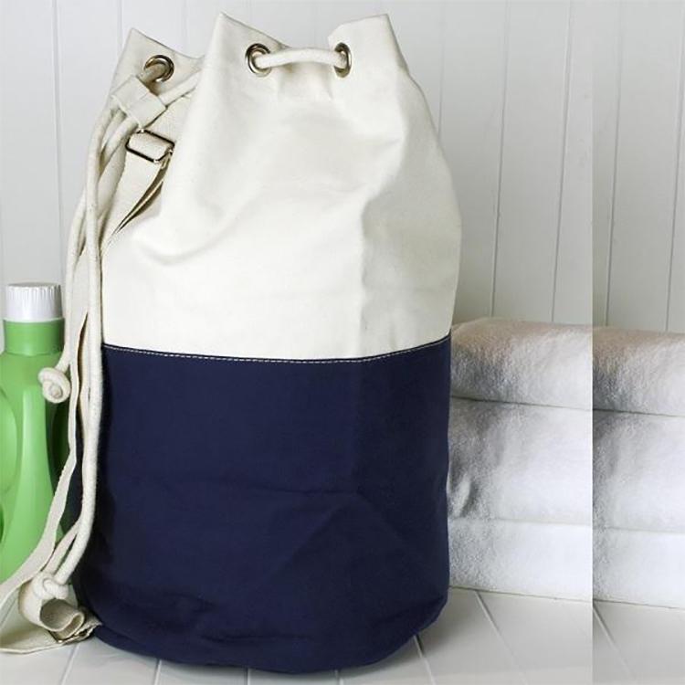 Dunes Drawstring Duffel bag in classic canvas with heavy rope closure and adjustable shoulder strap.