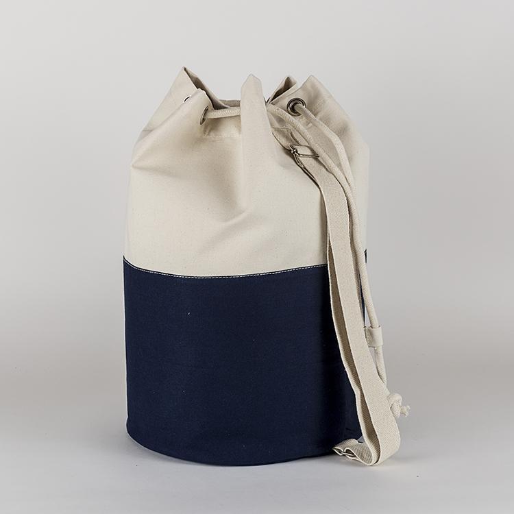 Dunes Drawstring Duffel bag in classic canvas with heavy rope closure and adjustable shoulder strap.