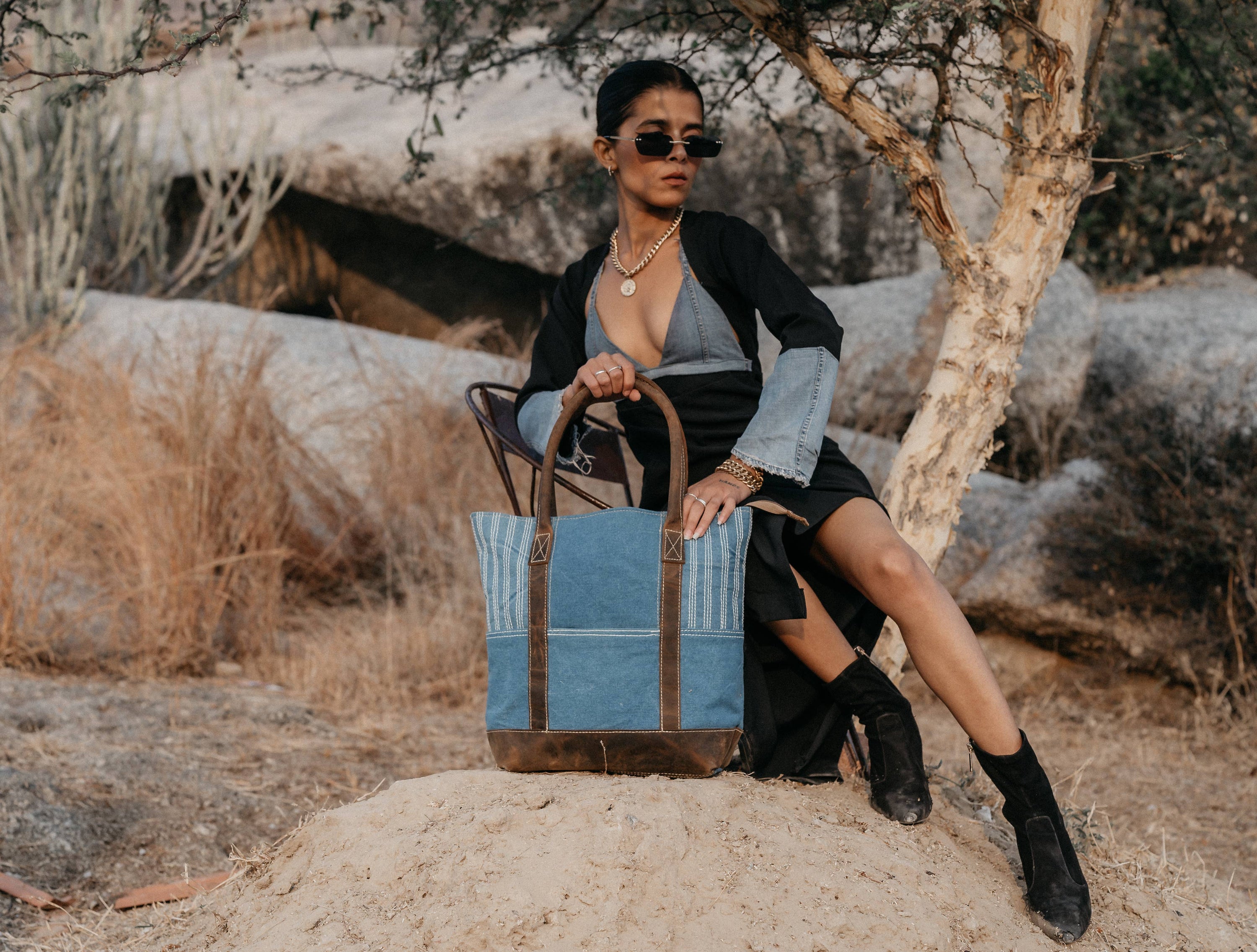 Eiro Tote Bag featuring a minimalist design with leather and denim elements, perfect for stylish everyday use.