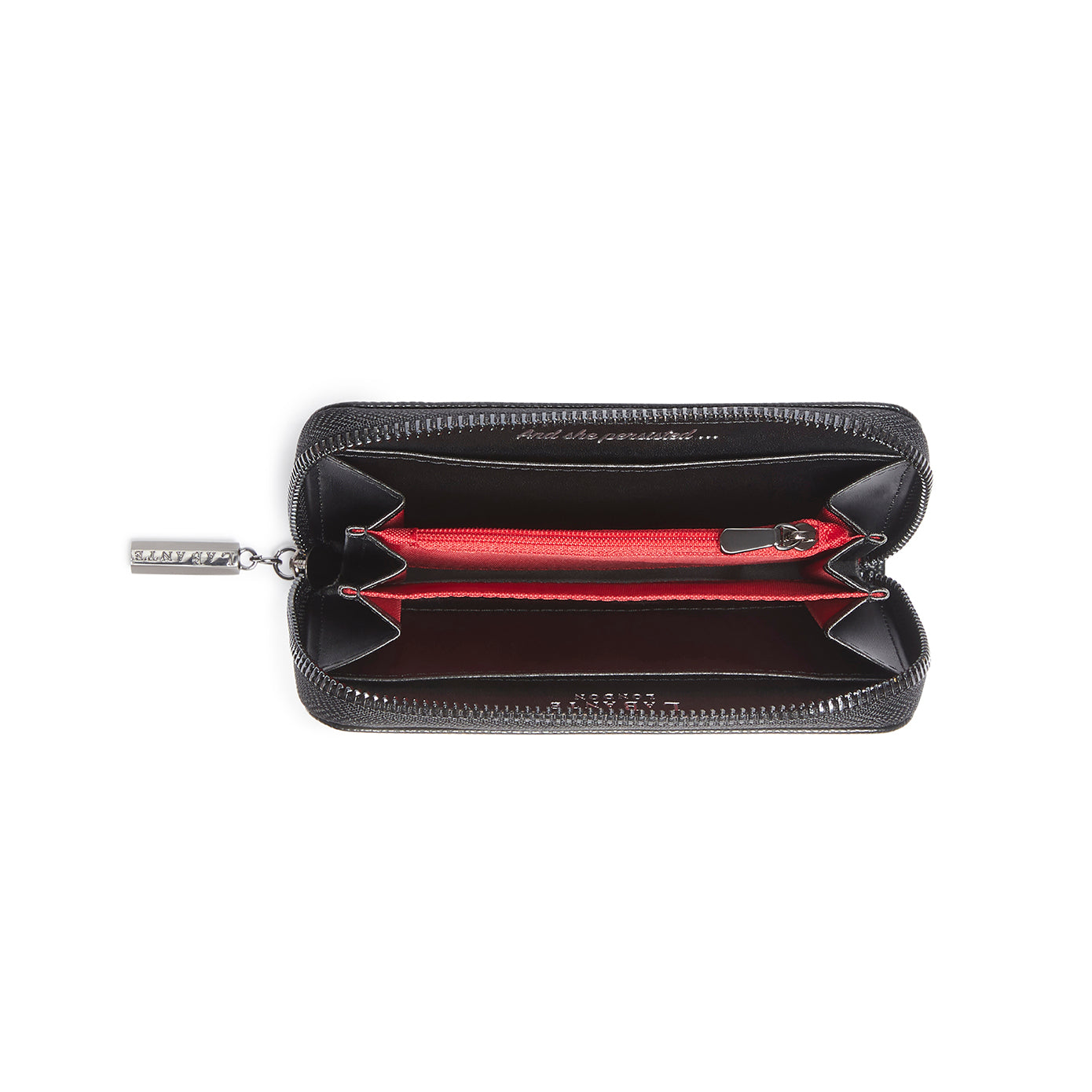 Ellen Black Zip Around Wallet featuring a textured vegan snake exterior, zip-around fastening, and multiple compartments for cards and coins.