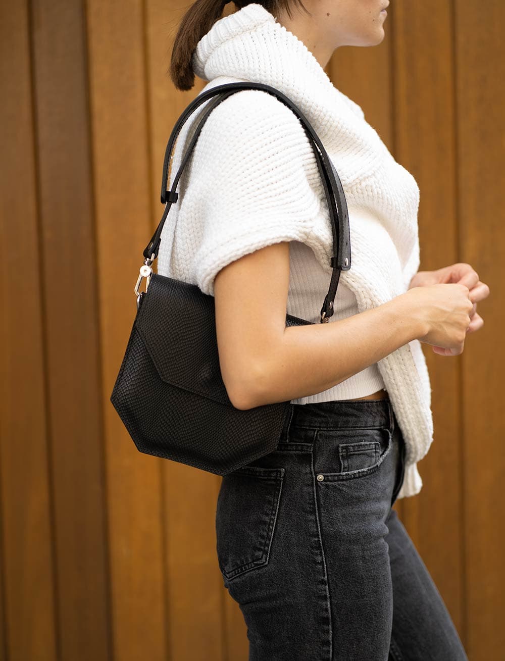 Hypatia embossed snake print purse made from premium Italian leather, featuring a hexagon shape and silver hardware.