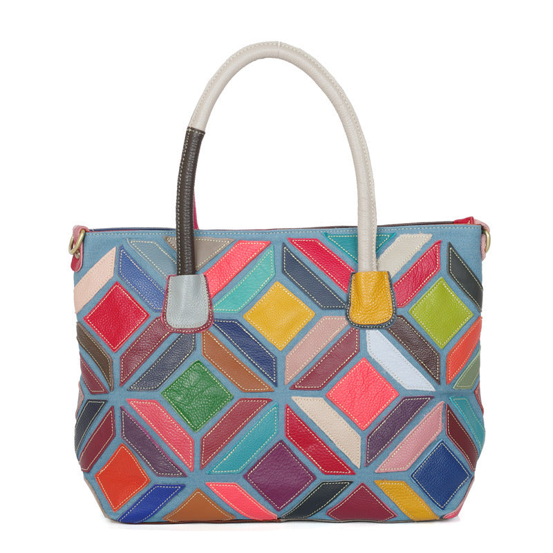 A colorful leather handbag featuring European American style with stitching details, medium size, and a zipper opening.