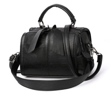 Elegant European American style one shoulder messenger bag with a trendy pillow shape and stylish belt decoration.