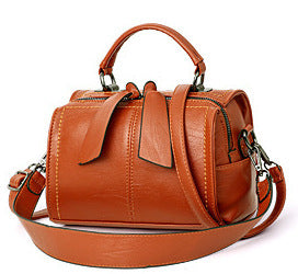 Elegant European American style one shoulder messenger bag with a trendy pillow shape and stylish belt decoration.