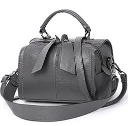 Elegant European American style one shoulder messenger bag with a trendy pillow shape and stylish belt decoration.