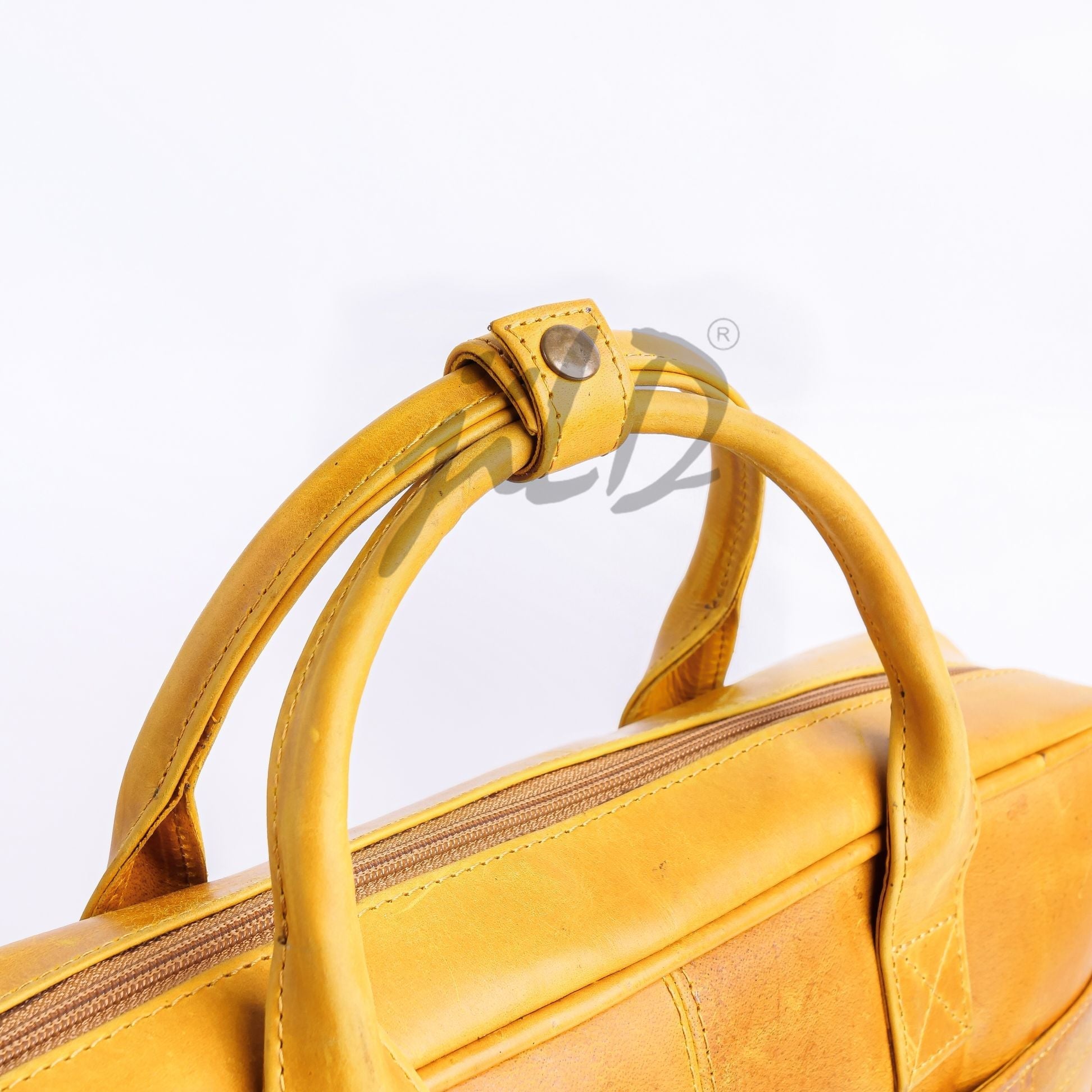 Everyday Companion Leather Laptop Bag in Camel Brown, showcasing its genuine leather texture and stylish design.