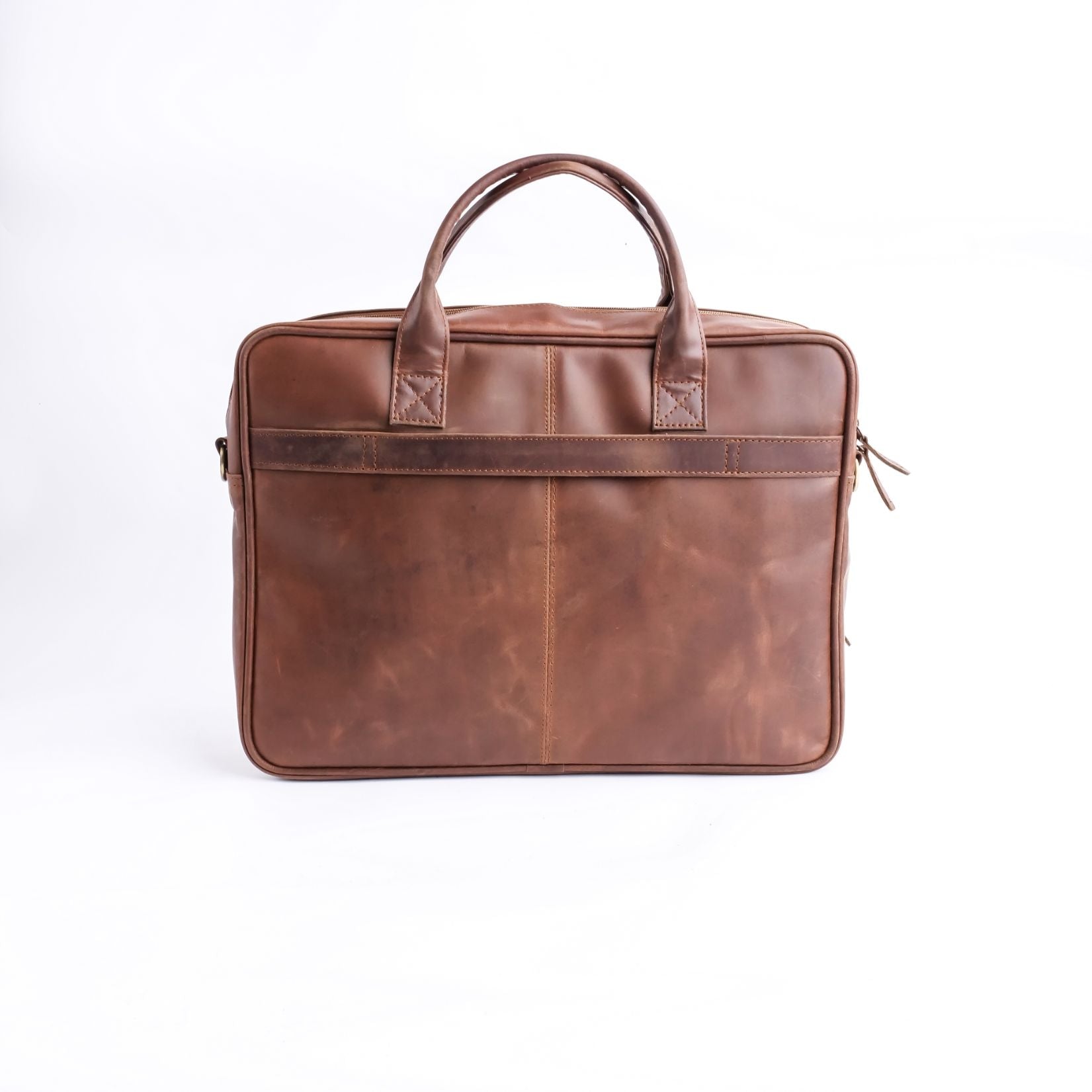 Tan brown leather laptop bag with vintage two-tone design, featuring adjustable shoulder strap and multiple compartments.