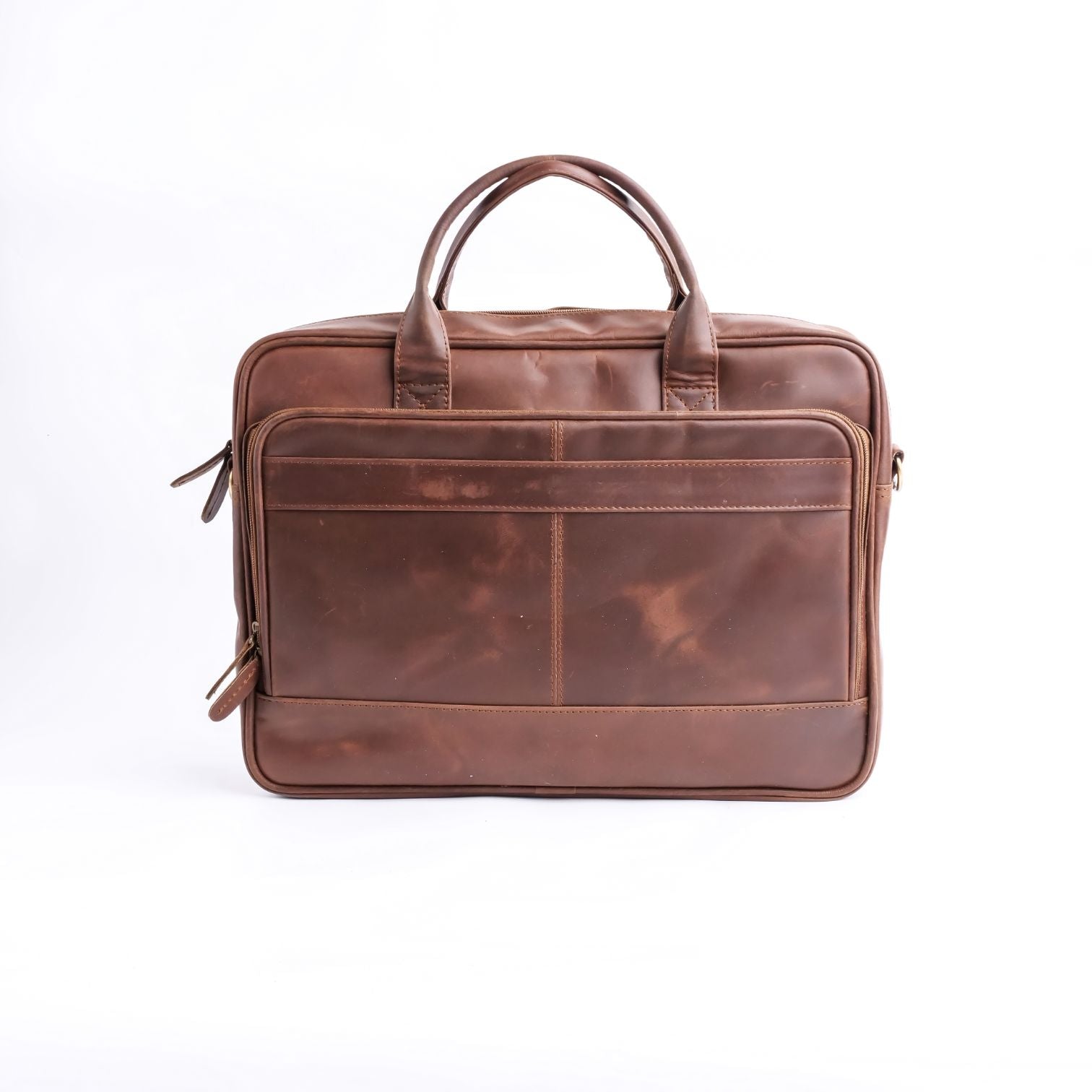 Tan brown leather laptop bag with vintage two-tone design, featuring adjustable shoulder strap and multiple compartments.