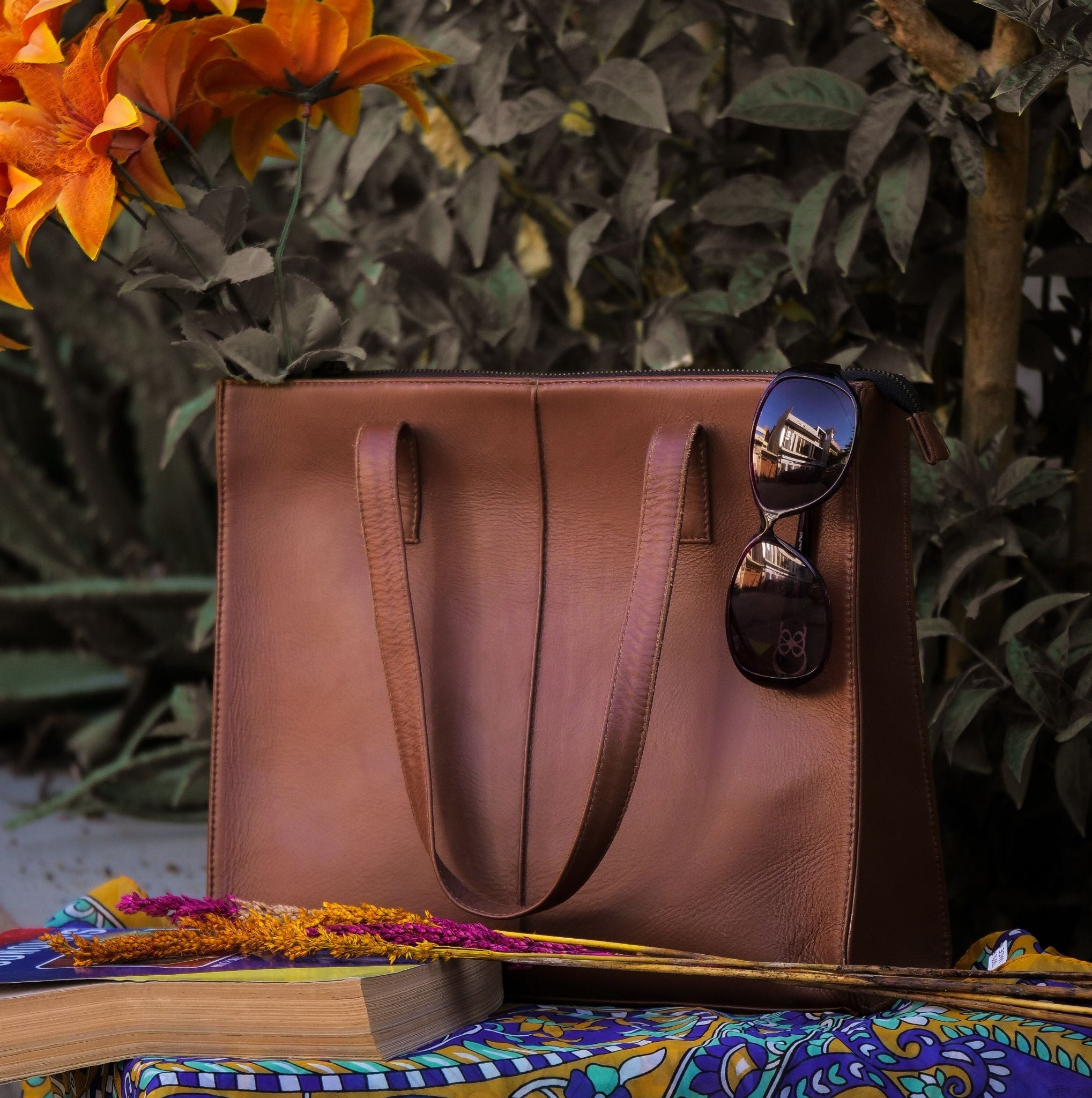 Everyday Women's Leather Zipper Tote Bag in Tan Brown, showcasing its spacious design and premium cow leather material.