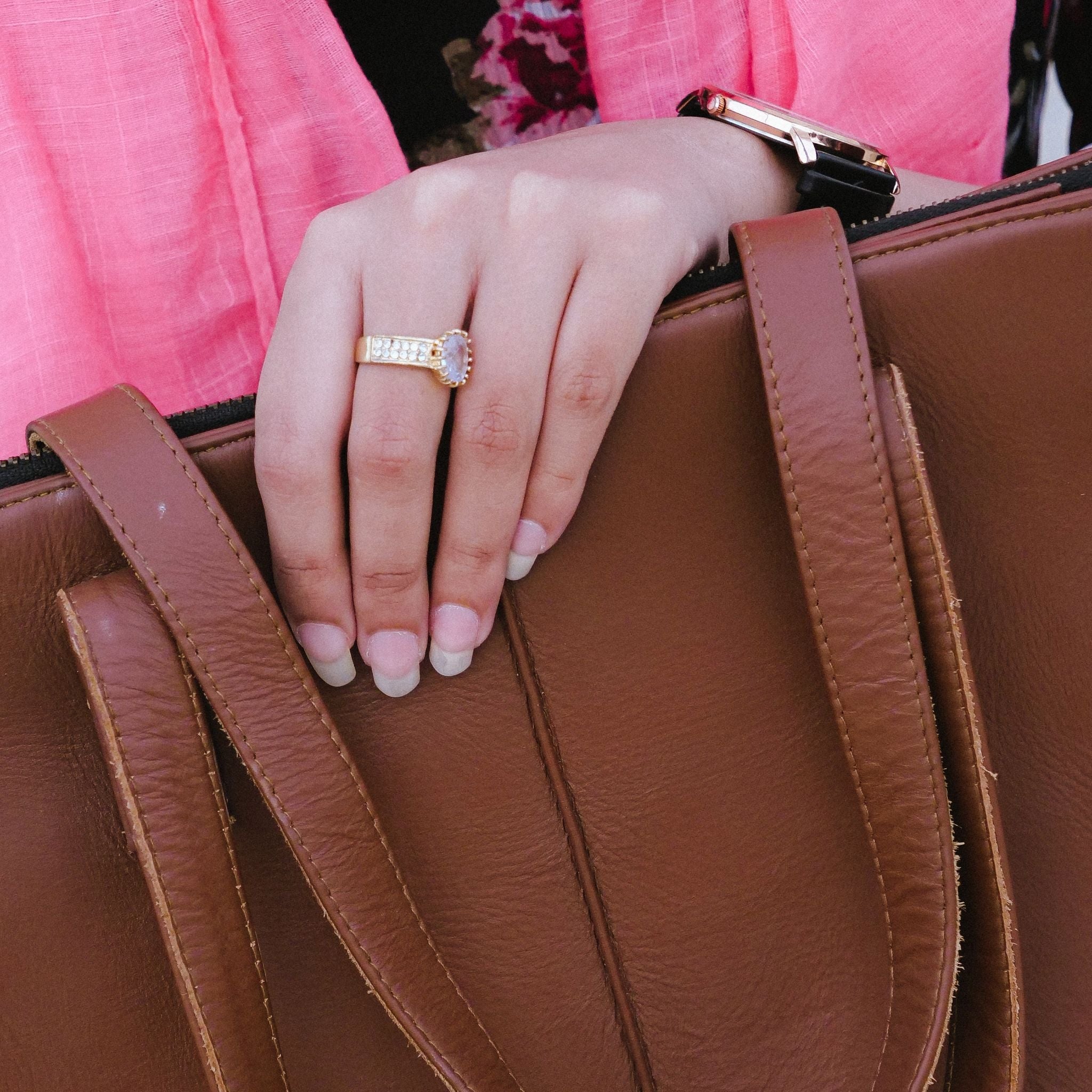 Everyday Women's Leather Zipper Tote Bag in Tan Brown, showcasing its spacious design and premium cow leather material.