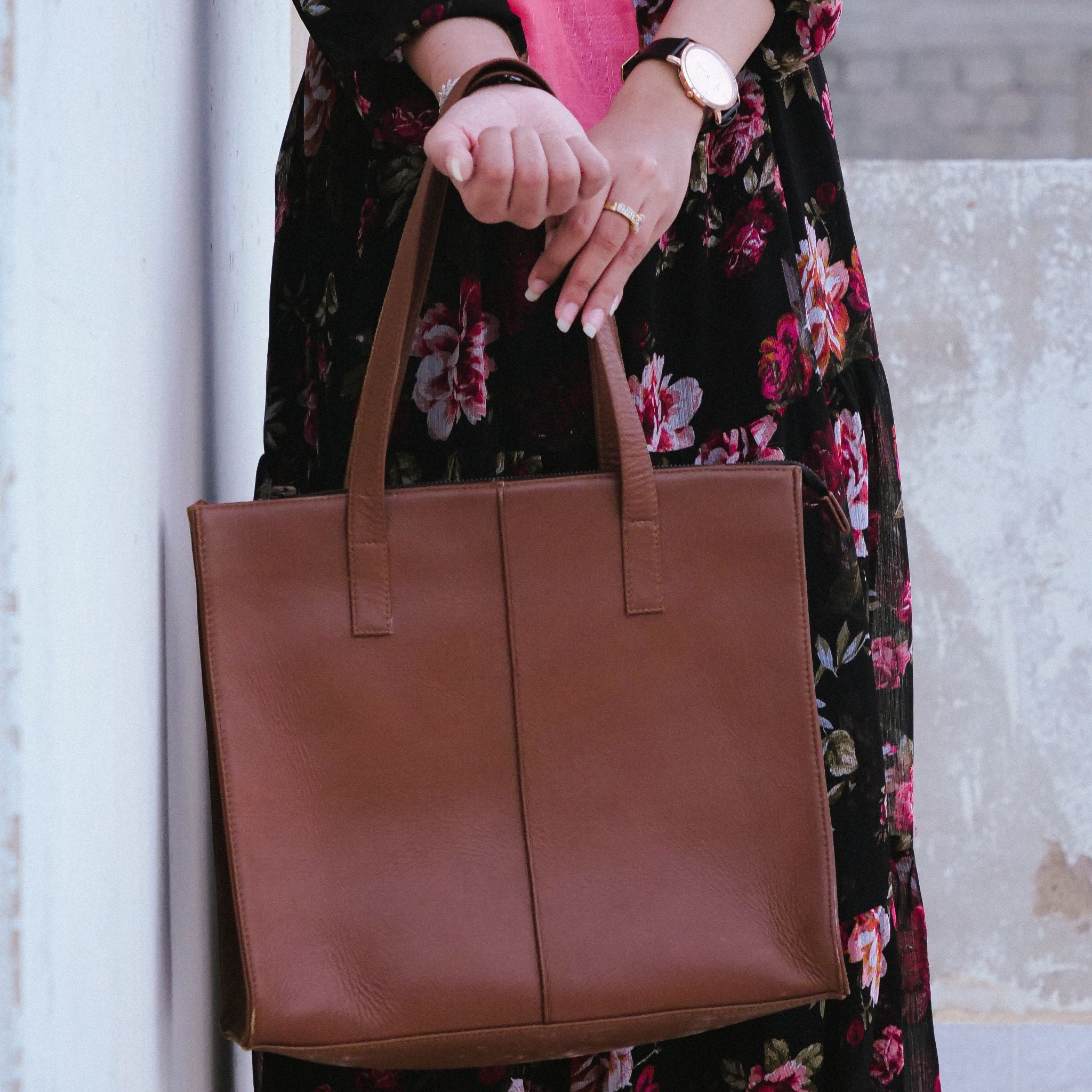 Everyday Women's Leather Zipper Tote Bag in Tan Brown, showcasing its spacious design and premium cow leather material.