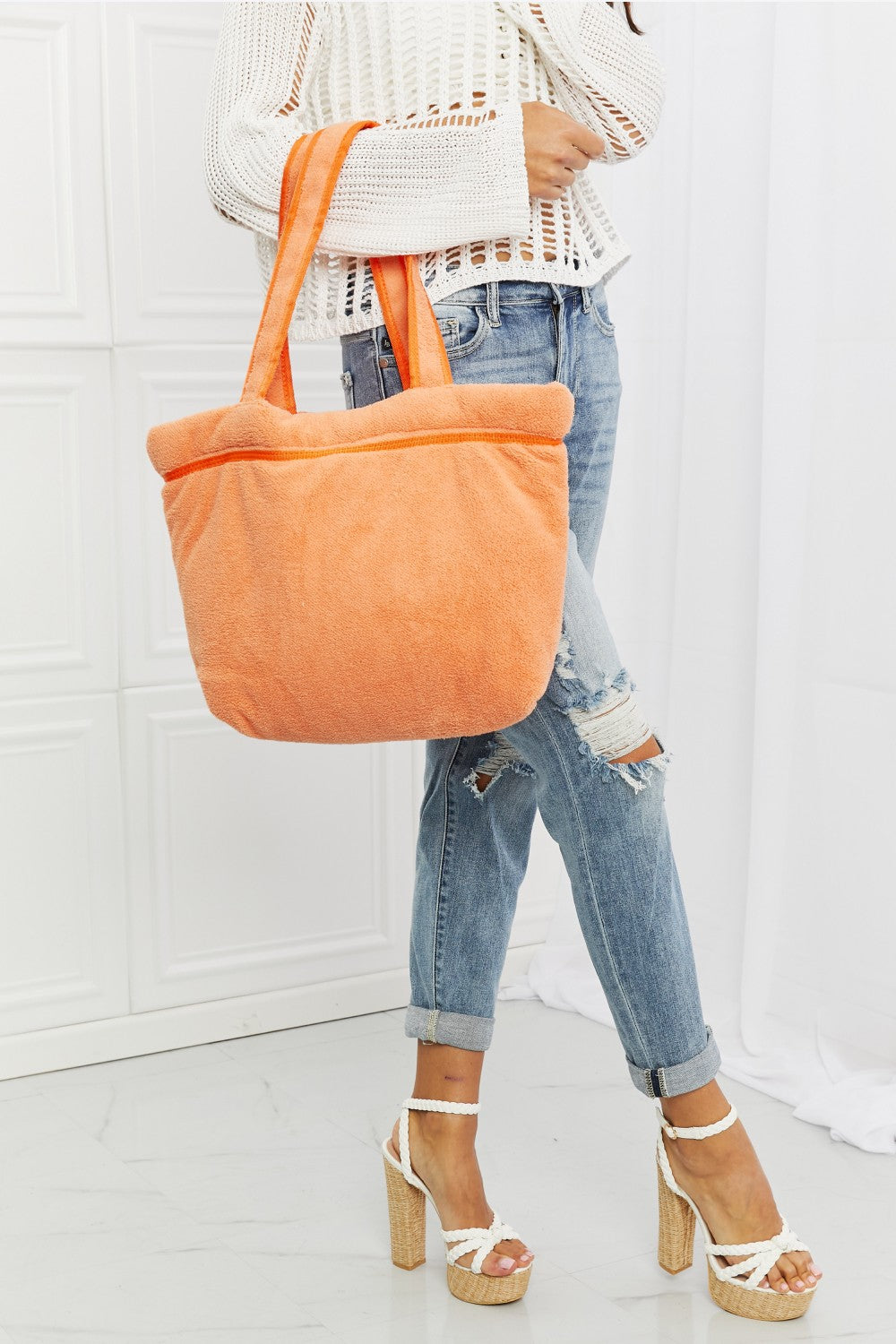 Vibrant orange Fame Found My Paradise Tote Bag with plush material, featuring zip and slip pockets, ideal for beach or pool use.