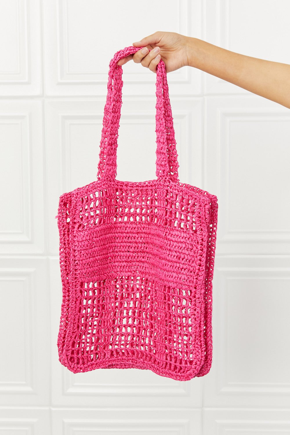 Fame Tropic Babe Straw Tote Bag in vibrant fuchsia with bold black lettering, perfect for summer outings.