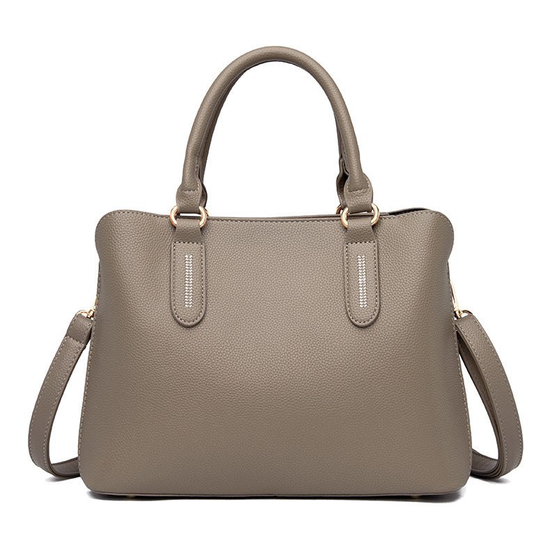 Fashionable single shoulder handbag in European and American style, featuring a bucket design and durable PU fabric.