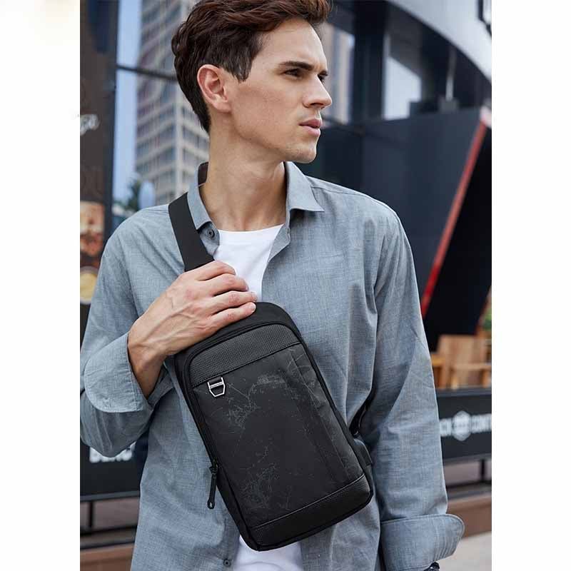 Fashion Men's Simple Polyester Crossbody Bag in black with zipper closure, showcasing its stylish and durable design.