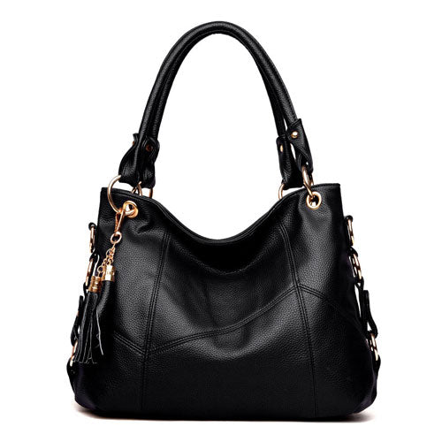 Fashionable one shoulder PU leather handbag for women, featuring a horizontal square shape and a stylish design.