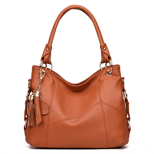 Fashionable one shoulder PU leather handbag for women, featuring a horizontal square shape and a stylish design.