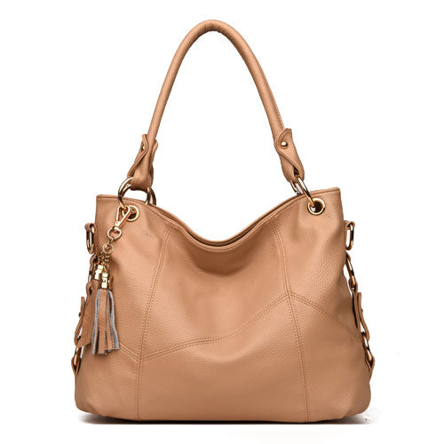 Fashionable one shoulder PU leather handbag for women, featuring a horizontal square shape and a stylish design.