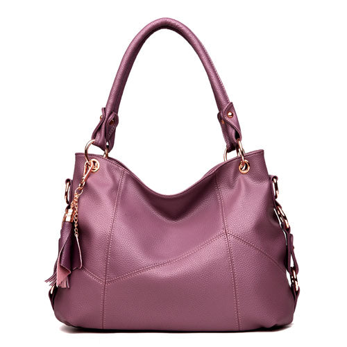 Fashionable one shoulder PU leather handbag for women, featuring a horizontal square shape and a stylish design.