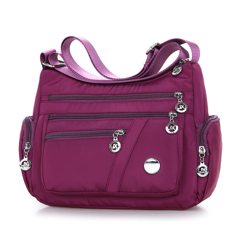 Fashion Solid Color Women's Casual Shoulder Messenger Bag made of durable Oxford cloth, featuring a single adjustable strap and medium size.