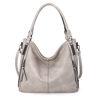 Fashionable large-capacity soft daily casual shoulder bag in stylish PU material, featuring a zipper closure and single strap design.