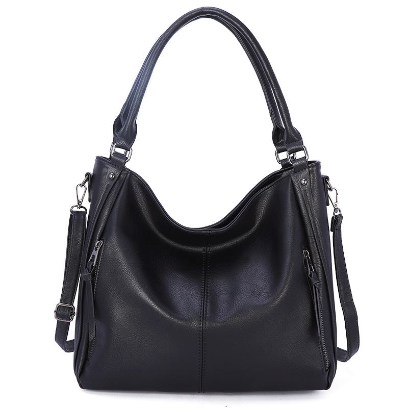 Fashionable large-capacity soft daily casual shoulder bag in stylish PU material, featuring a zipper closure and single strap design.