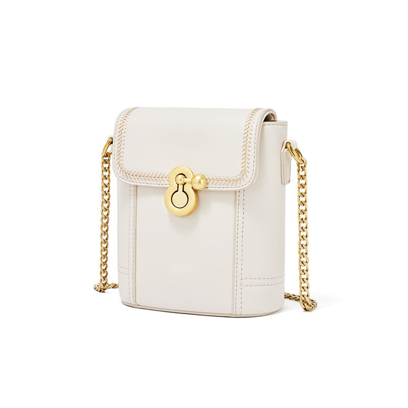 Fresh and Sweet One Shoulder Messenger Chain Bucket Bag with trendy embroidery, showcasing its stylish design and compact size.