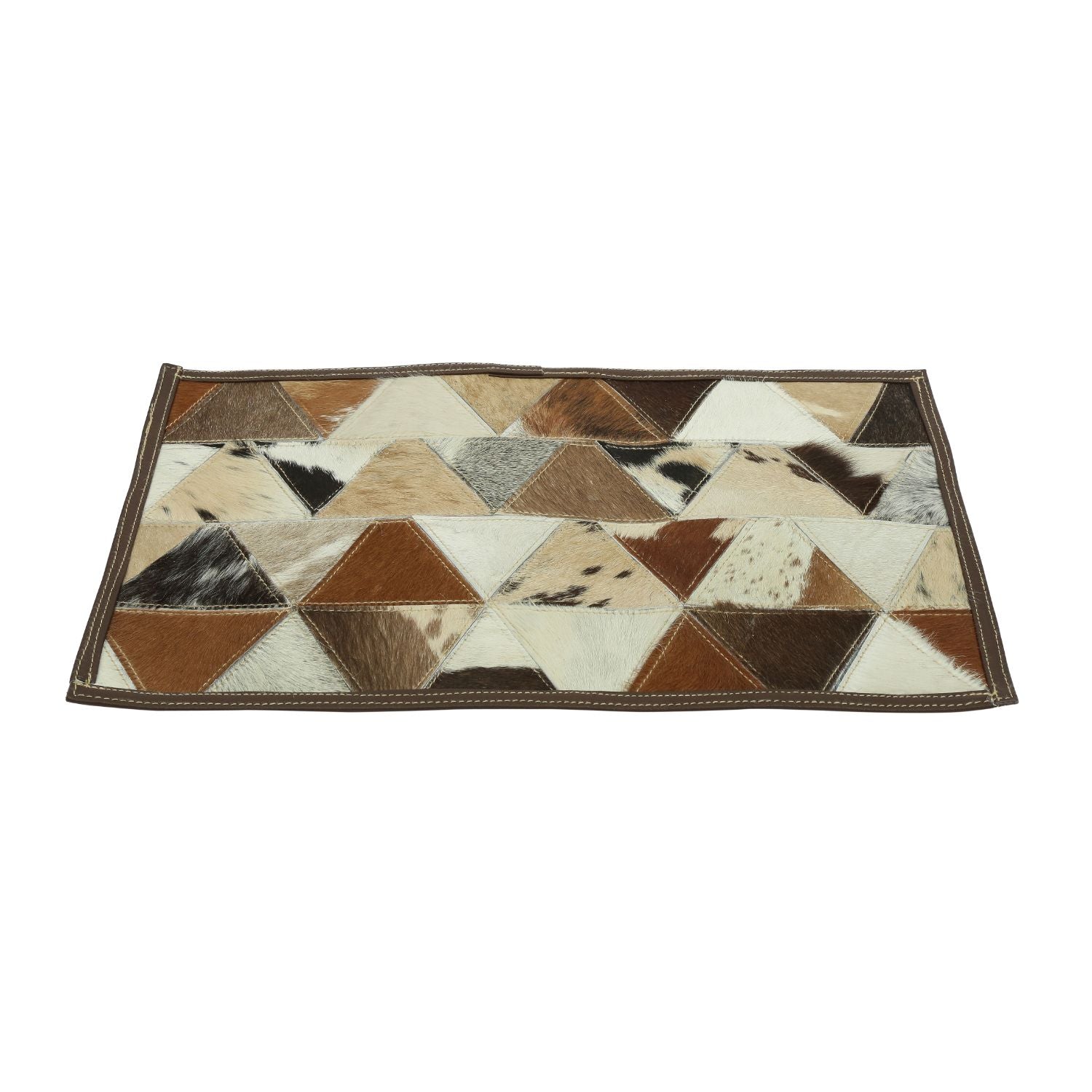 Givo Table Placemat made of handmade leather with a unique hair-on design, showcasing its elegant texture and craftsmanship.