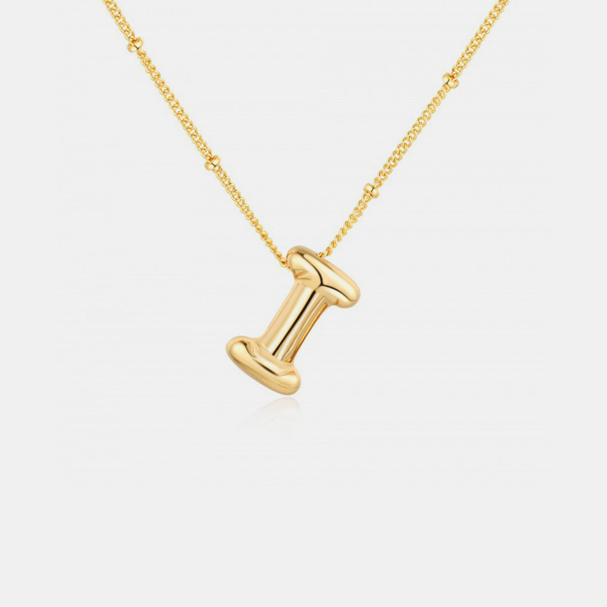 Gold-Plated Letter Pendant Necklace featuring a personalized letter charm on a delicate chain.