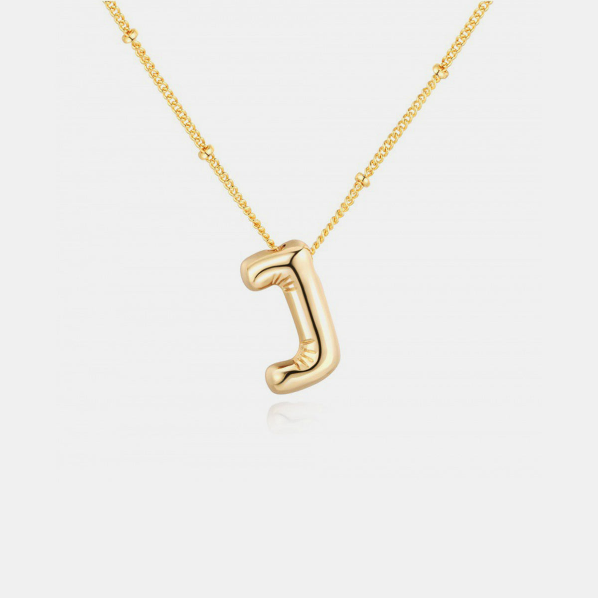 Gold-Plated Letter Pendant Necklace featuring a personalized letter charm on a delicate chain.