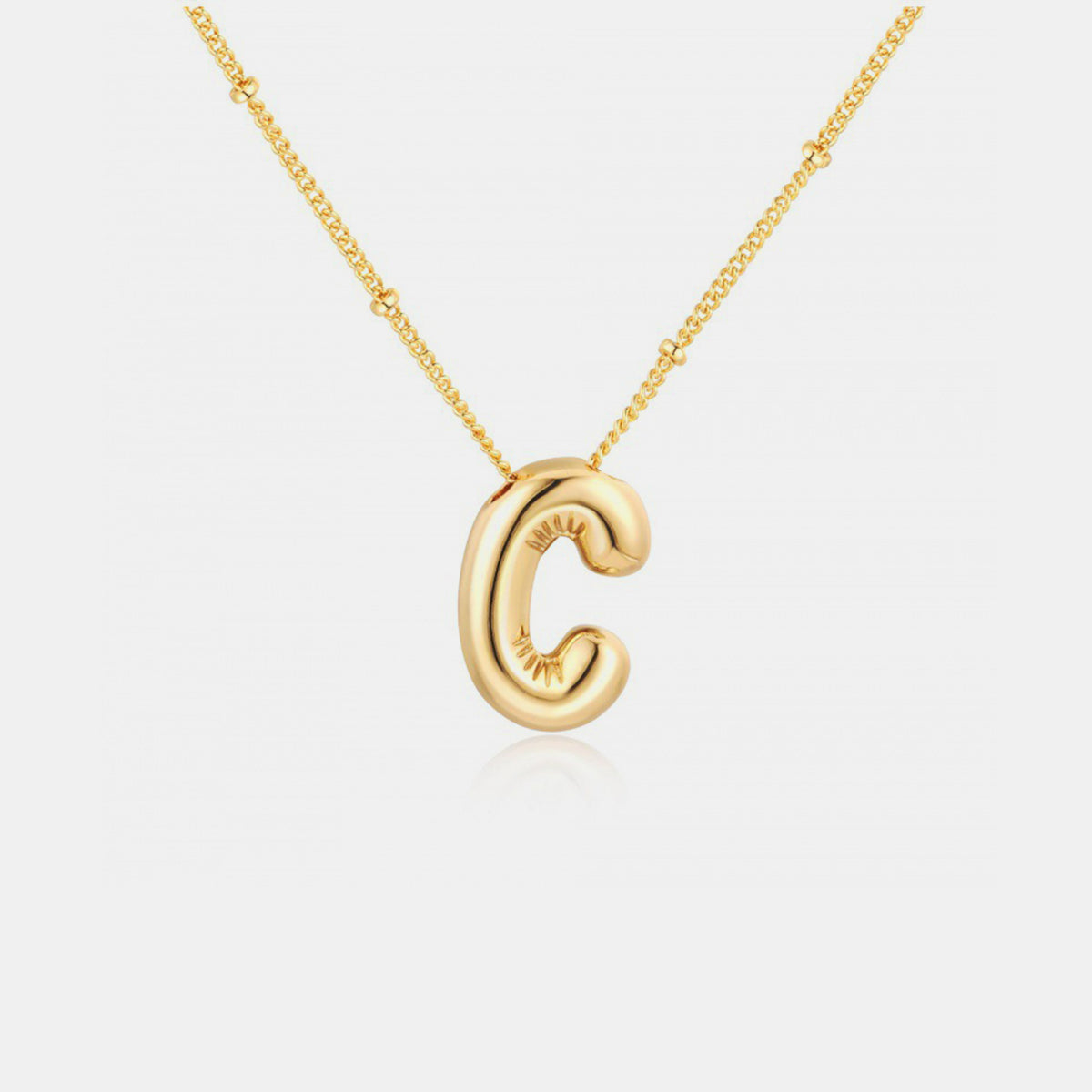 Gold-Plated Letter Pendant Necklace featuring a personalized letter charm on a delicate chain.