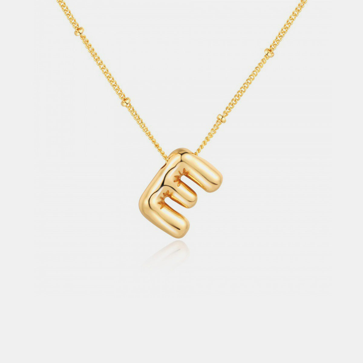 Gold-Plated Letter Pendant Necklace featuring a personalized letter charm on a delicate chain.