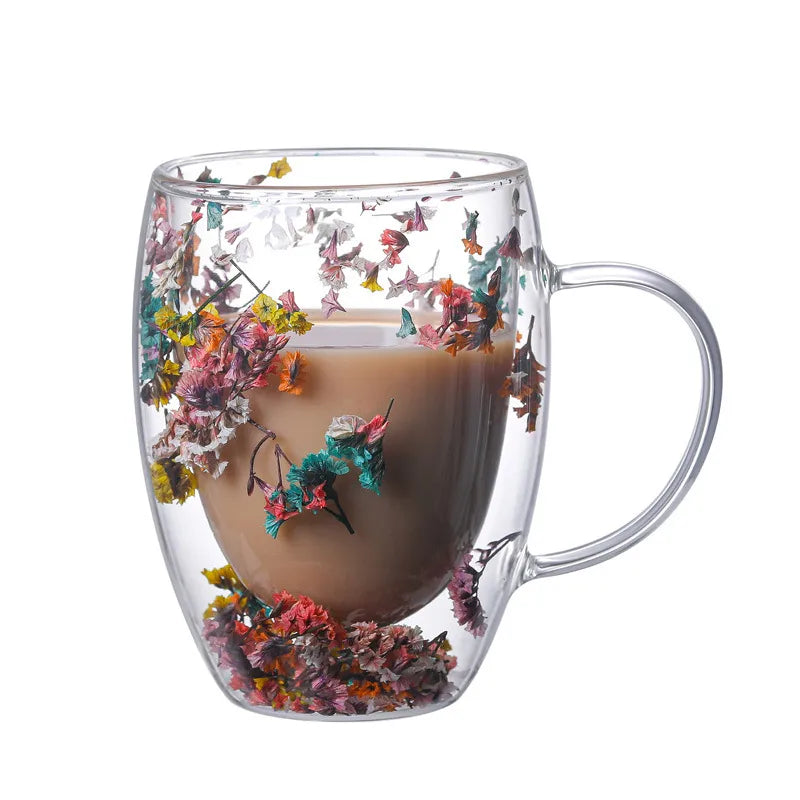 A set of Gorgeous High End Borosilicate Glass Cups with Handle featuring floral and shell designs, showcasing their elegant round shape and transparent glass.