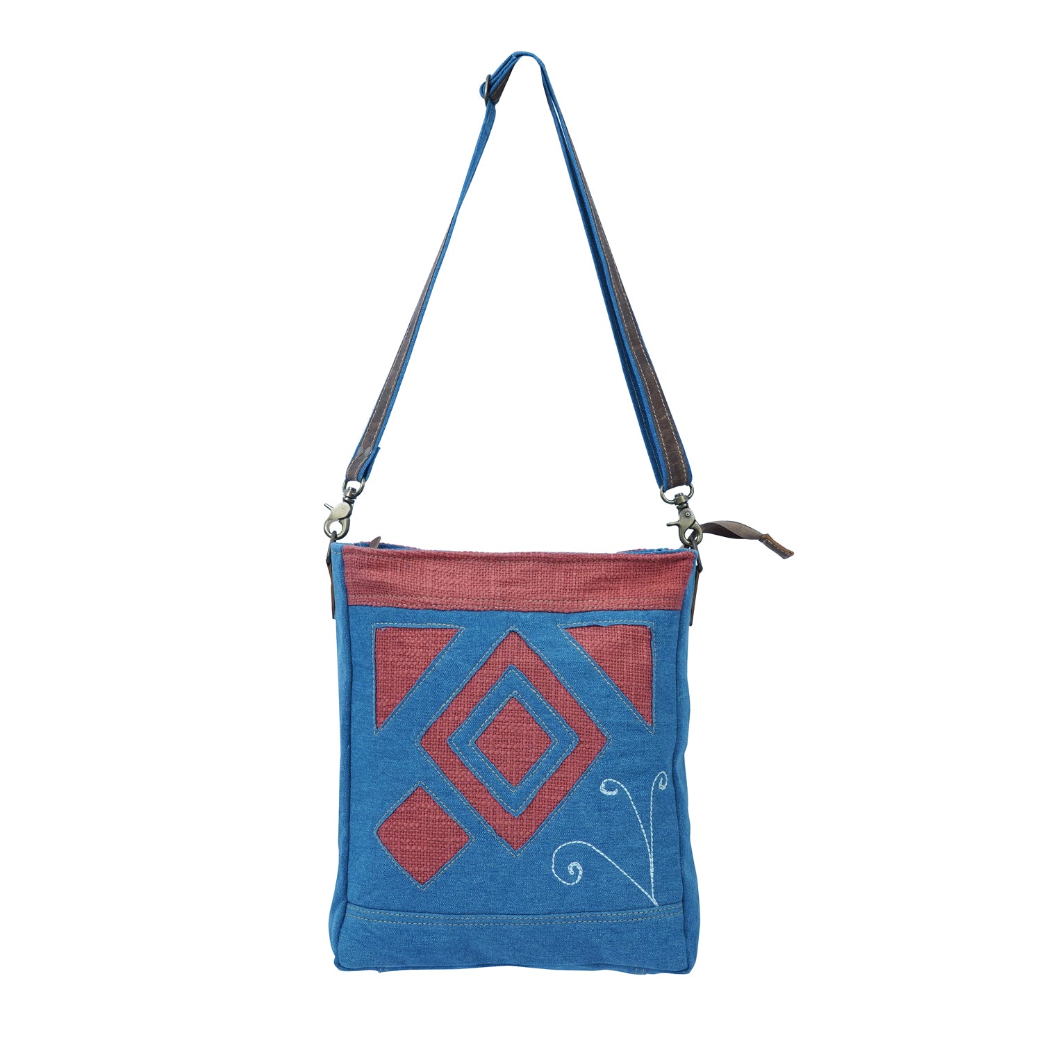 Gyur Shoulder Bag made of high-quality blue denim canvas with adjustable straps, showcasing its stylish and casual design.