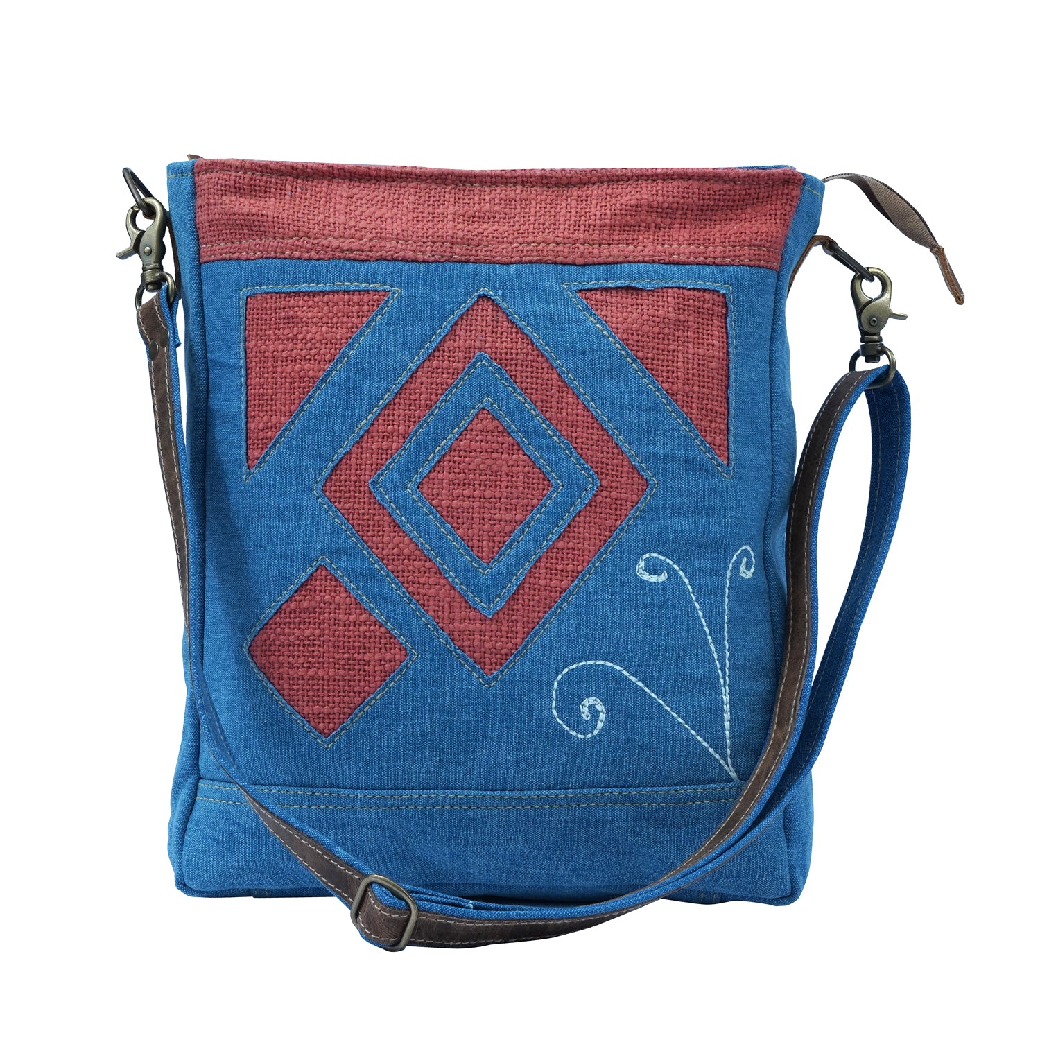 Gyur Shoulder Bag made of high-quality blue denim canvas with adjustable straps, showcasing its stylish and casual design.