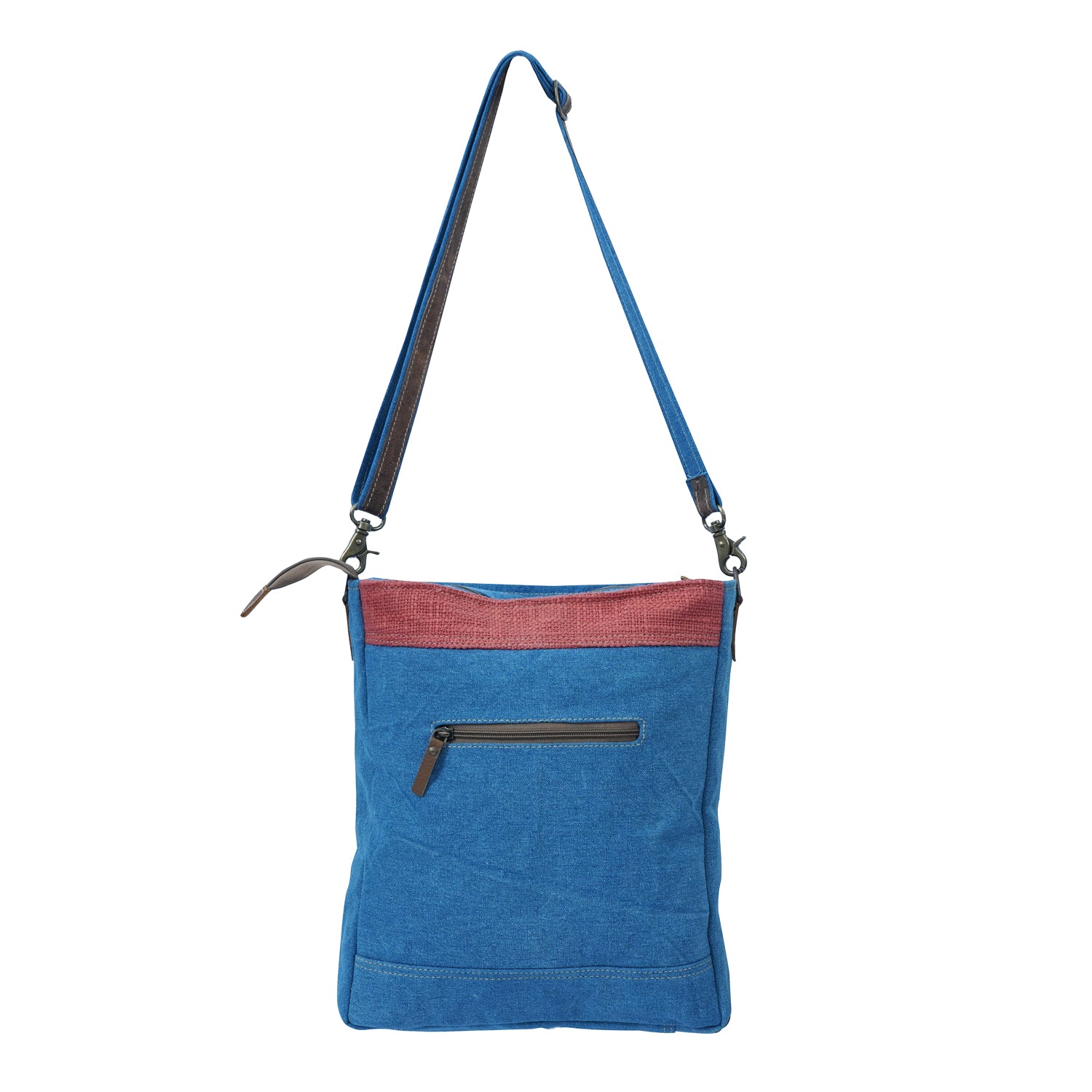 Gyur Shoulder Bag made of high-quality blue denim canvas with adjustable straps, showcasing its stylish and casual design.